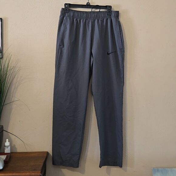 NIKE GRAY WINDBREAKER DRI-FIT PANTS, SIZE LARGE - Picture 1 of 9